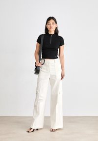 Calvin Klein Jeans VARIEGATED HALF ZIP - Basic póló - black
