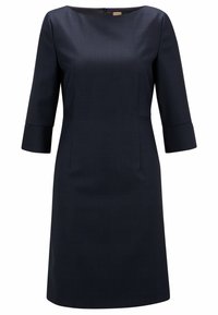 Robe à carreaux bleu marine avec des manches trois-quart, un col rond et une fermeture éclair au dos. Tissu lisse avec une coupe ajustée.