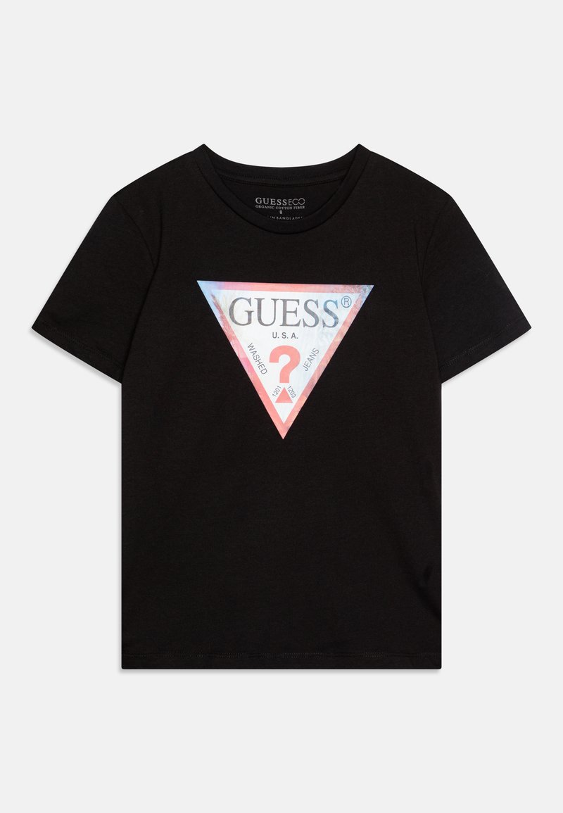 Mustmust värvi t-särk, millel on suur kolmnurkne logo pastellsetes toonides, millel on tekst "GUESS® U.S.A. WASHED JEANS" ja küsimärgi kujund.