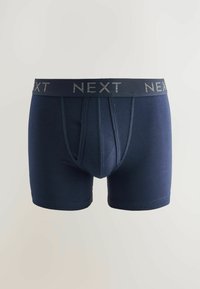 Temno modri bokserice iz mehkega materiala, featuring širok elastičen pas z oznako "NEXT". Tesno prilegajoči se kroj z moderno zasnovo.
