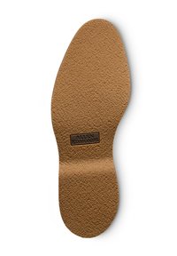 Insole marrone con superficie testurizzata, caratterizzata da un logo rettangolare impresso al centro. Punta arrotondata e forma sagomata per supporto del piede.