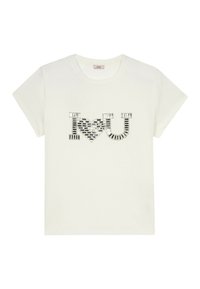 Camiseta de algodón blanca con un gráfico de lentejuelas que dice "Te ❤️ U" en un patrón combinado en negro y plata. Diseño de mangas cortas y cuello redondo.