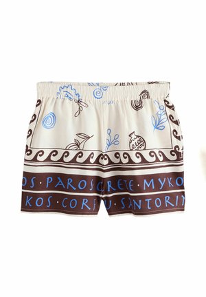 Korte cremefarvede shorts med brune og blå navne på græske øer samt dekorative bølge- og plante mønstre. Elastisk talje.