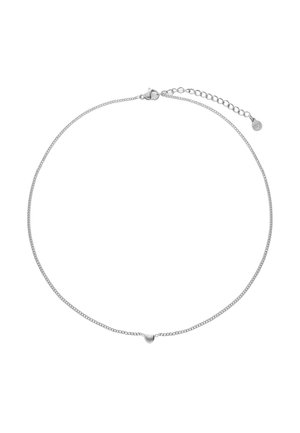 Collier délicat en chaîne d'argent avec un petit pendentif en forme de cœur et une fermeture à boucle ajustable.