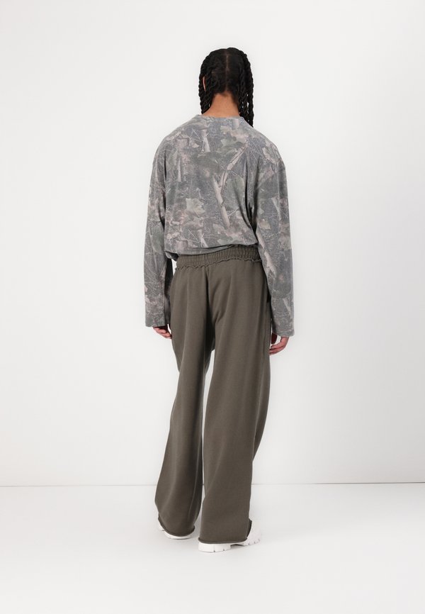 MONSTER UNISEX - Tracksuit bottoms2