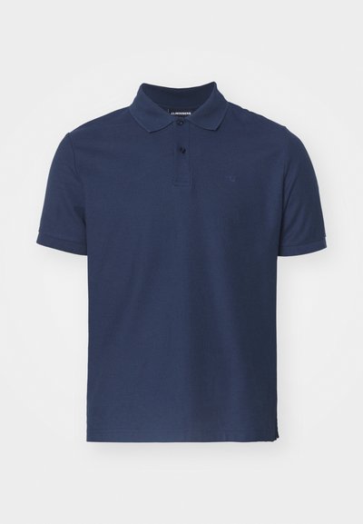Navy blue polo shirt made of soft cotton with a classic collar, three button placket, and a small logo on the chest. Short sleeves.