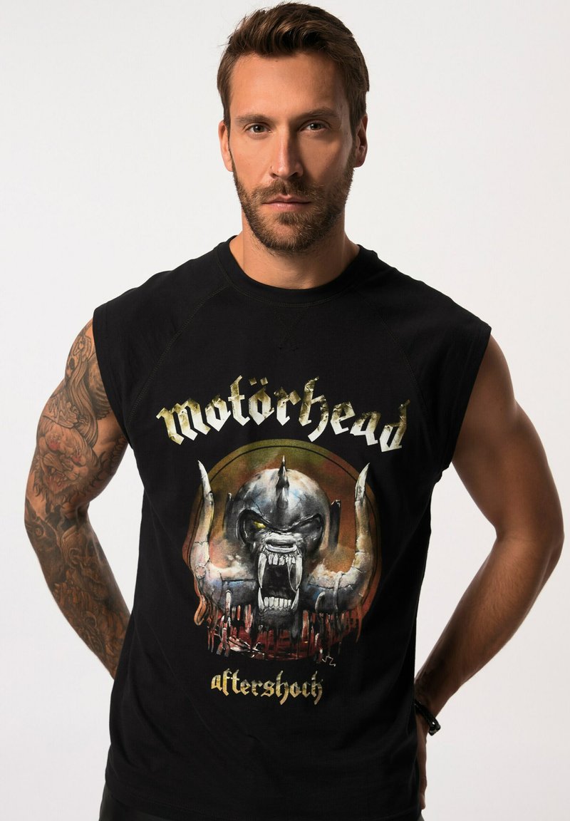 Schwarzes ärmelloses T-Shirt mit einem Grafikdesign eines Schädels mit Hörnern und tropfenden Details, beschriftet mit "Motörhead Aftershock" in stylisierter Schrift.