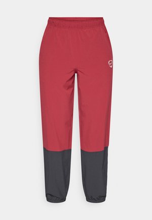 Κόκκινες αθλητικές παντελόνες με γκρι πάνελ στα κάτω πόδια. Ελαστική μέση και μανσέτες, με λογότυπο στο αριστερό μηρό.