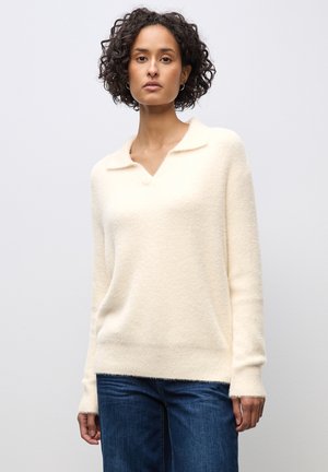 Stickad tröja - beige