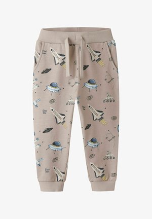 Pantaloni beige per bambini con stampa a tema spaziale che presenta razzi, UFO, astronauti, satelliti e stelle, con vita a coulisse e tasche.
