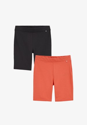 Deux paires de shorts extensibles mi-genoux en noir et terre cuite, chacune avec un petit logo étoile près de la taille.