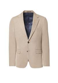Beżowa marynarka z teksturowanej tkaniny, z klapą w kształcie litery V, dwoma przednimi kieszeniami i wzorzystą granatową podszewką. Brązowe guziki zdobią zapięcie.