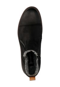 Schwarze Knöchelstiefel aus glattem Leder mit weichem grauem Innenfutter, seitlichen Reißverschlüssen, brauner Naht und einem beige-farbigen Fersenlasche.