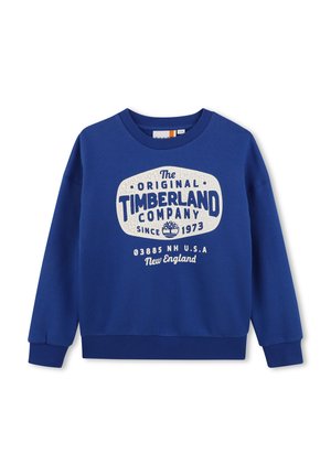 Niebieska bluza z okrągłym dekoltem, z białym logo Timberland i tekstem: "The Original Timberland Company since 1973, New England, U.S.A."