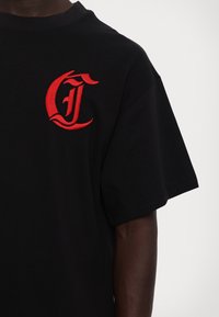 Just Cavalli Triko s potiskem - black