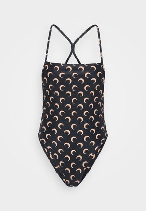 Black swimsuit featuring a repeating crescent moon pattern in peach. It has thin, crisscross straps and a sleek design with moderate coverage.