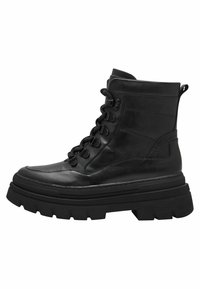 Bottines en cuir noir avec une épaisse semelle en caoutchouc, dotées d'un bout rond, d'un laçage à l'avant et d'une languette à l'arrière. Tige texturée avec couture.