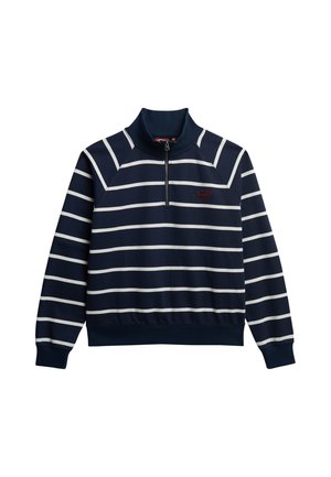 Sweatshirt bleu marine à fermeture éclair quart avec des rayures horizontales blanches et un texte rouge brodé sur la poitrine gauche, manches longues, et poignets et ourlet côtelés.