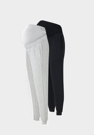 Două perechi de pantaloni de trening pentru gravide cu talie elastică, una gri deschis și una neagră, prezentate una lângă alta pe un fundal simplu.