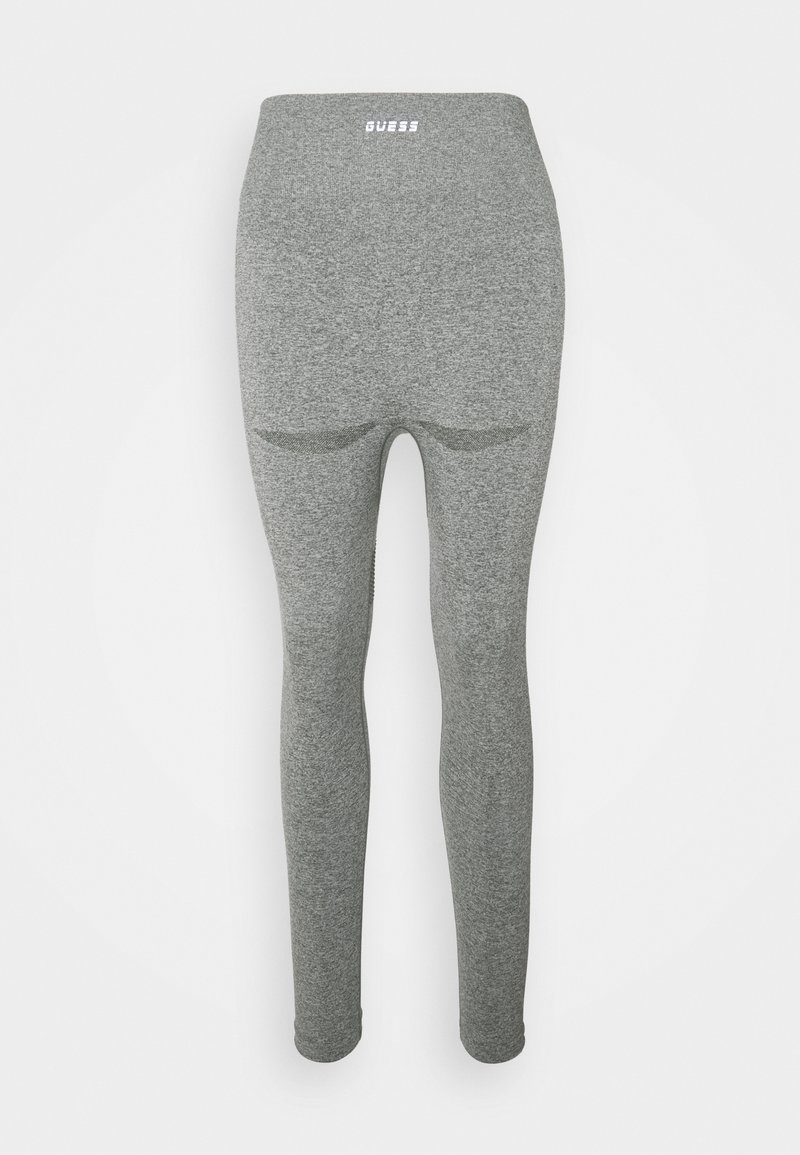 Leggings grigi con un design attillato, realizzati in un tessuto elasticizzato, dotati di un alto punto vita e cuciture sottili per il contorno. Logo del marchio sulla parte superiore.
