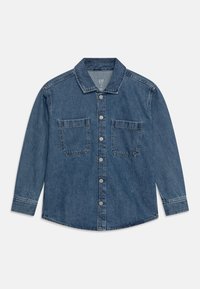 Denim shirt featuring a classic collar, button-front closure, two chest pockets, and long sleeves in a medium blue wash.
