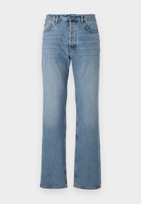 Light blue flared jeans with a mid-rise waist, five pockets, and a button closure. Made of denim with subtle fading and stitching details.
