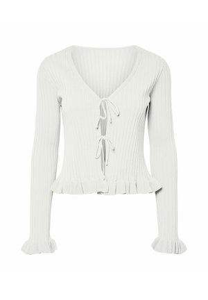 Balts ribots džemperis ar garām piedurknēm, V veida izgriezums, divas priekšējās aizdares ar sasiešanu, volāna apakšmala un volāni pie piedurkņu galiem.
