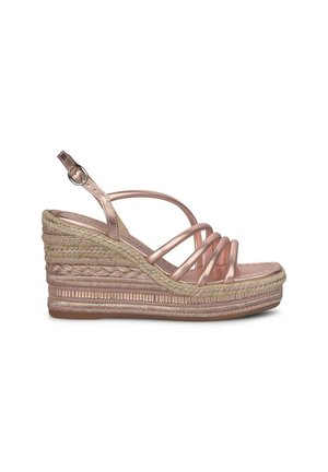 Rose gold wedge sandal with multiple crossed straps and an espadrille-style woven jute base. Smooth metallic finish with a textured heel.