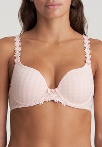 Light pink padded bra with a checkered pattern, lace-trimmed detailing, and floral accents on straps. Small bow at the center.