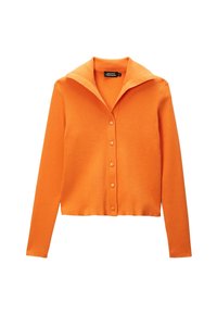 Gilet côtelé orange avec un large col, des manches longues et six boutons sur le devant ; présente une longueur cropped.