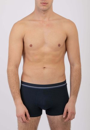 Boxer blu navy con una cintura a contrasto, realizzati in tessuto morbido, con una tasca frontale e cuciture ricamate.