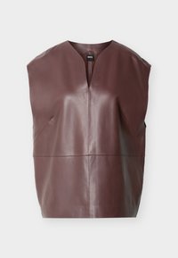 Καφέ δερμάτινο τοπ χωρίς μανίκια με λαιμόκοψη σε σχήμα V, δομημένους ώμους και ραφές στη περιοχή του στήθους και της μέσης.