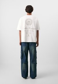 Don't Waste Culture REZO UNISEX - Laza szabású farmerek - dark blue