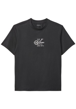 Maglietta nera a maniche corte con scollo rotondo e logo "cK" bianco di Calvin Klein al centro del petto.