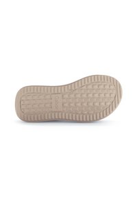 Lichtbeige rubberen schoenzool met een gestructureerd grippatroon, ronde vorm en een reliëflogo "Gabor" in het midden.