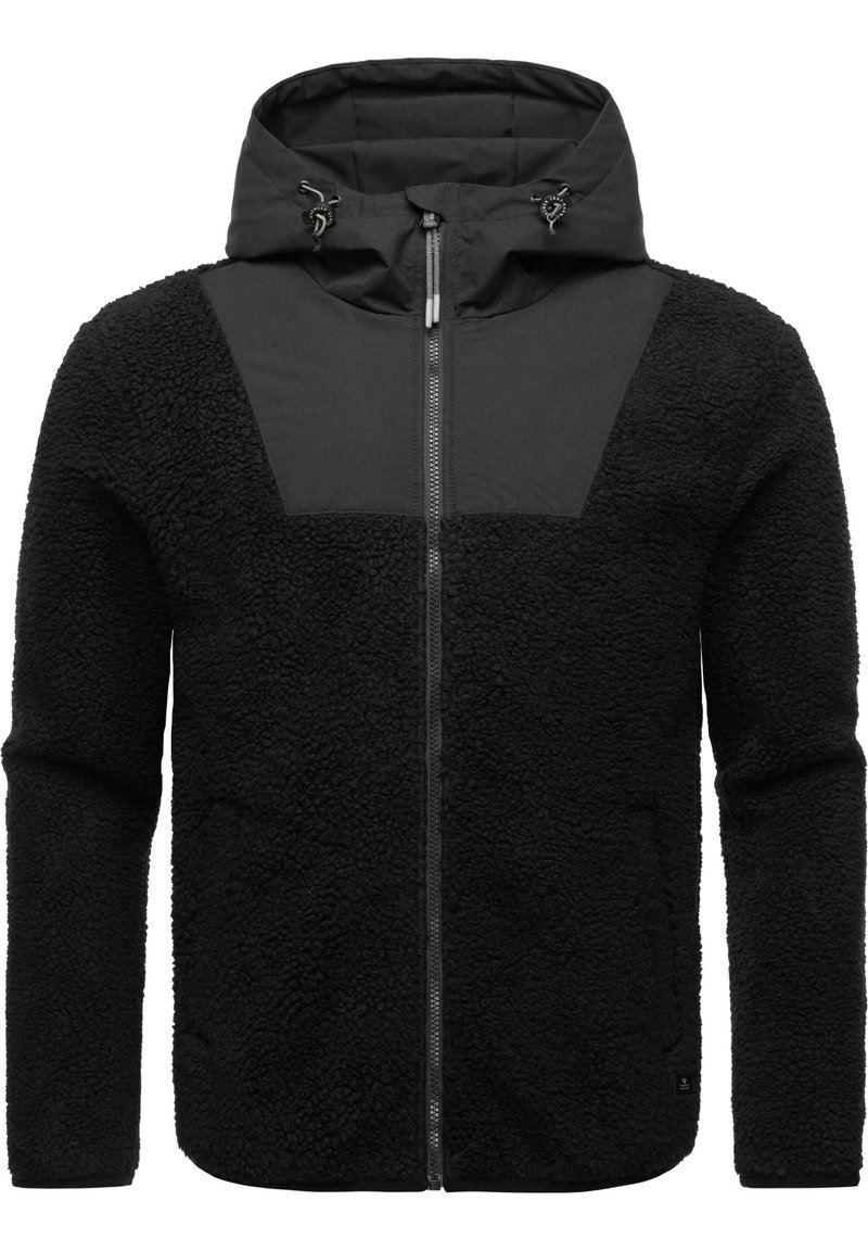 Giacca in pile nera con cappuccio, caratterizzata da un pannello superiore in tessuto liscio, chiusura con zip e corpo testurizzato. Cappuccio regolabile con cordini.