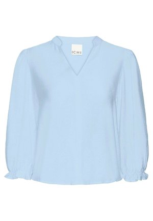 Light blue blouse with a V-neck, puffed long sleeves, and gathered cuffs. Soft, textured fabric with a relaxed fit. Brand label: ICHI.