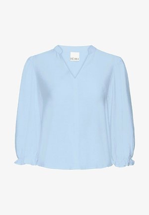 Light blue blouse with a V-neck, puffed long sleeves, and gathered cuffs. Soft, textured fabric with a relaxed fit. Brand label: ICHI.