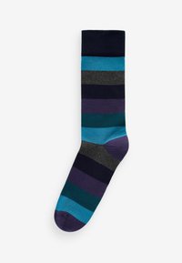 Calcetín a rayas que presenta una mezcla de tonos azul marino oscuro, verde azulado, gris, verde y púrpura. Fabricado con una tela elástica y transpirable con una textura suave.