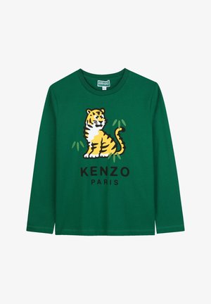 Groene langwerpige t-shirt met lange mouwen met een gele tijgerafbeelding en de tekst "KENZO PARIS" in het zwart. Gemaakt van zacht katoen.