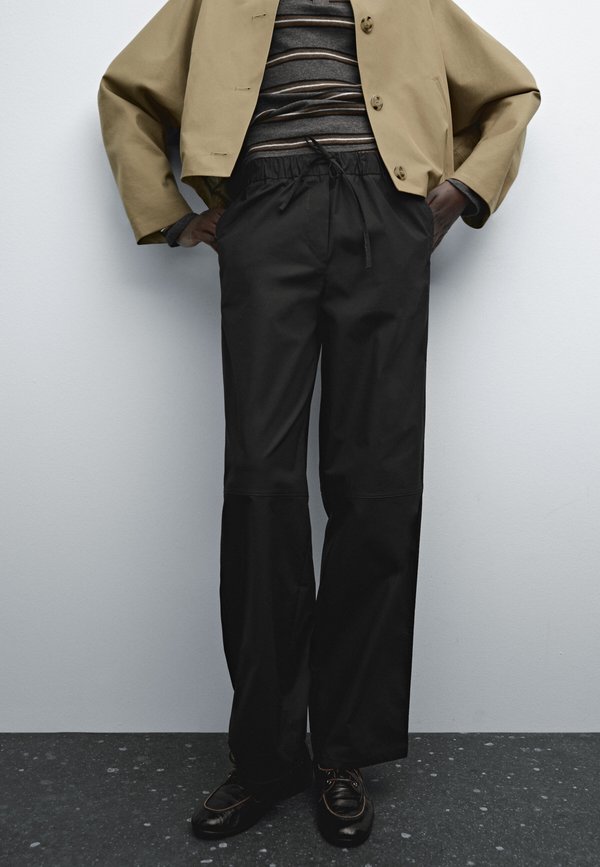 WITH ELASTICATED WAISTBAND - Trousers