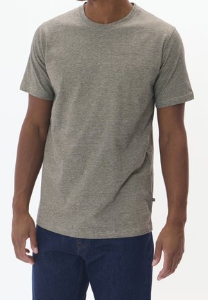 Szara bawełniana koszulka z okrągłym dekoltem, krótkimi rękawami i luźnym krojem. Tkanina ma delikatną melanżową fakturę.