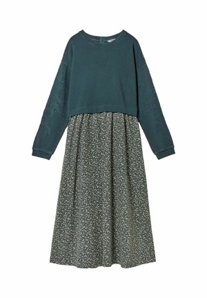 Long-sleeve dark green top with eyelet embroidery on sleeves, attached to a high-waist, dark floral-patterned midi skirt.