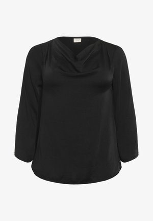 Fekete blúz hosszú ujjakkal, sálkivágással és puha, sima textúrával. Lazább szabású, lekerekített szegéllyel rendelkezik.