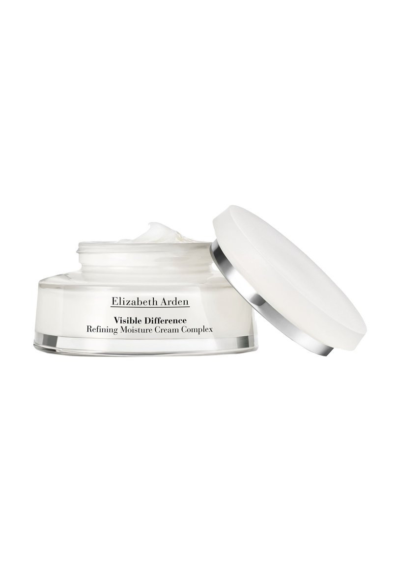 Round, clear glass jar with a white cream and silver accent lid. Label reads "Elizabeth Arden Visible Difference Refining Moisture Cream Complex."