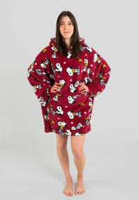 Red fleece oversized hoodie featuring Snoopy and Woodstock graphics, with white polka dots. Soft texture and large front pocket.