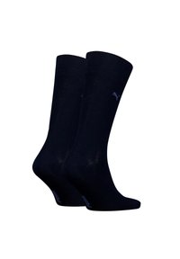 Calcetines de algodón negro de corte crew con puños acanalados y un logo sutil. Presentan una textura suave y suelas ligeramente acolchadas para mayor comodidad.