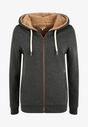 Sötét szürke cipzáras kapucnis pulóver bézs bolyhos béléssel, krém színű zsinórokkal és barna díszítéssel a zsebeken. Puha anyag ribbelt mandzsettával.