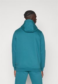 Puma TAPE HOODIE - Felpa - cold green