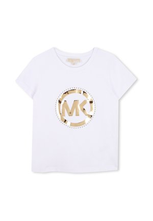 T-shirt blanc à manches courtes avec logo MK métallique doré à l'intérieur d'un cercle, orné de petits clous dorés autour du logo.